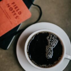 flat lay photography of filled teacup